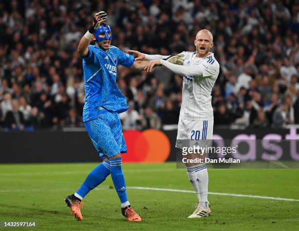 Kamil Grabara of FC Copenhagen celebrates with team mate Nicolai Boilesen of FC Copenhagen after saving a penalty during the UEFA Champions League...