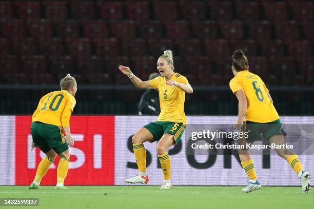 Rhiannon Roberts of Wales celebrates scoring their side's first goal with teammates Jessica Fishlock and Angharad James during the 2023 FIFA Women's...