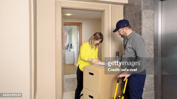 cargo delivery - hand truck stock pictures, royalty-free photos & images