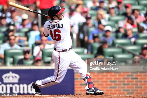 Travis d'Arnaud of the Atlanta Braves hits a home run against the Philadelphia Phillies during the second inning in game one of the National League...