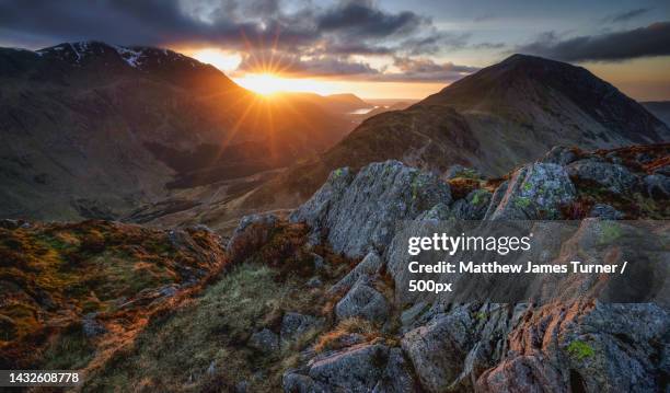 scenic view of mountains against sky during sunset,haystacks,cockermouth,united kingdom,uk - haystacks lake district stock pictures, royalty-free photos & images