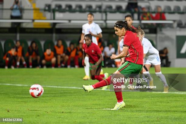 Carole Costa of Portugal scores their sides first goal from the penalty spot during the 2023 FIFA Women's World Cup play-off round 1 match between...