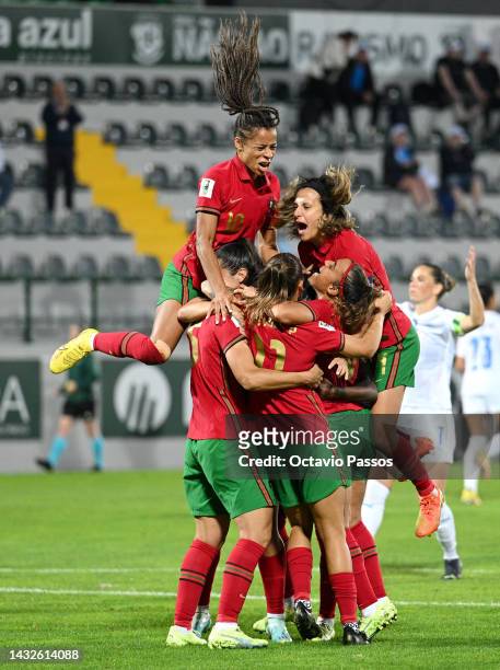 Carole Costa of Portugal celebrates with team mates after scoring their sides first goal from the penalty spot during the 2023 FIFA Women's World Cup...