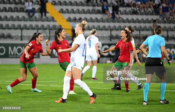Carole Costa of Portugal celebrates with team mates after scoring their sides first goal from the penalty spot during the 2023 FIFA Women's World Cup...