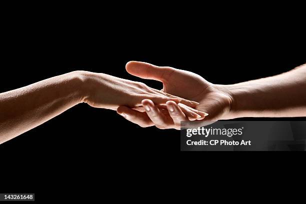hands - caballerosidad fotografías e imágenes de stock