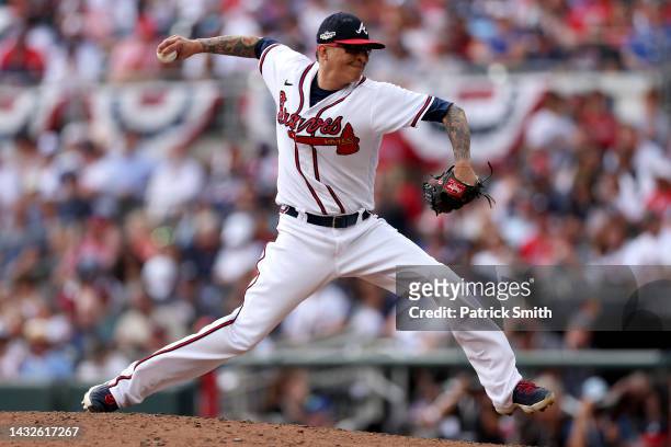 Jesse Chavez of the Atlanta Braves delivers a pitch against the Philadelphia Phillies during the fourth inning in game one of the National League...