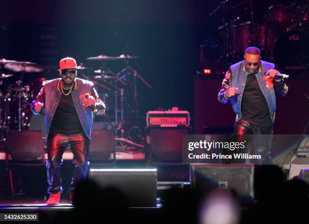 Marvin "Slim" Scandrick and Michael "Mike" Keith of 112 perform onstage during Atlanta R&B Music Experience Concert at State Farm Arena on October...