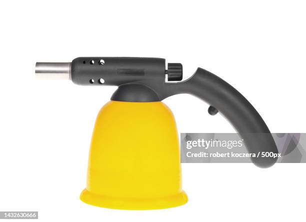 close-up of spraying water against white background,poland - blowlamp stock pictures, royalty-free photos & images