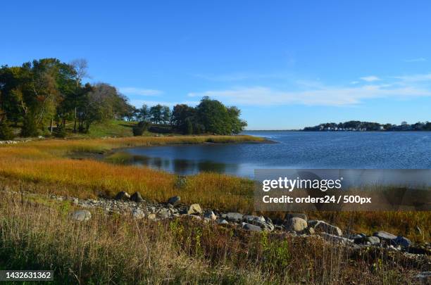 beautiful landscape of the ocean off the coast of worlds end park - hingham imagens e fotografias de stock