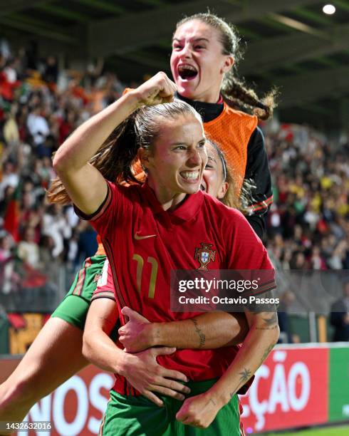 Tatiana Pinto of Portugal celebrates with team mates after scoring their sides third goal during the 2023 FIFA Women's World Cup play-off round 1...