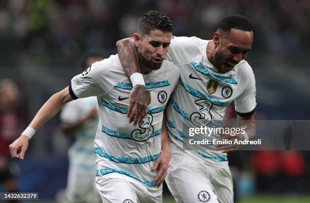 Jorginho of Chelsea FC celebrates with his team-mate Pierre-Emerick Aubameyang after scoring the opening goal during the UEFA Champions League group...