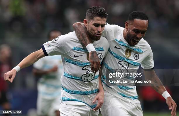 Jorginho of Chelsea FC celebrates with his team-mate Pierre-Emerick Aubameyang after scoring the opening goal during the UEFA Champions League group...