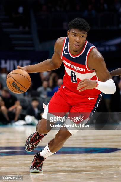Rui Hachimura of the Washington Wizards dribbles during the fourth quarter of the game against the Charlotte Hornets at Spectrum Center on October...