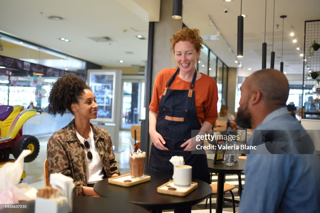 Script Being Waitress Man And Woman Being Served By A Waitress In A Cafeteria High-Res Stock ...