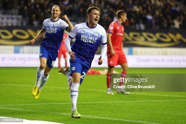 Nathan Broadhead of Wigan Athletic celebrates after scoring their sides first goal during the Sky Bet Championship between Wigan Athletic and...