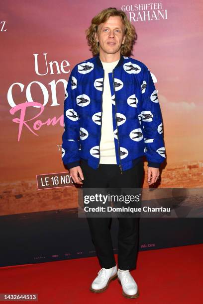 Alex Lutz attends the "Une Comédie Romantique" premiere at cinema Pathe Wepler on October 11, 2022 in Paris, France.