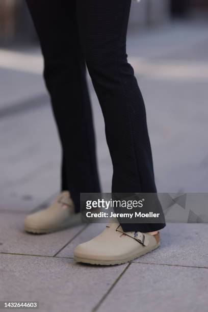 Victoria Thomas seen wearing Birkenstock shoes and H&M pants on October 09, 2022 in Cologne, Germany.