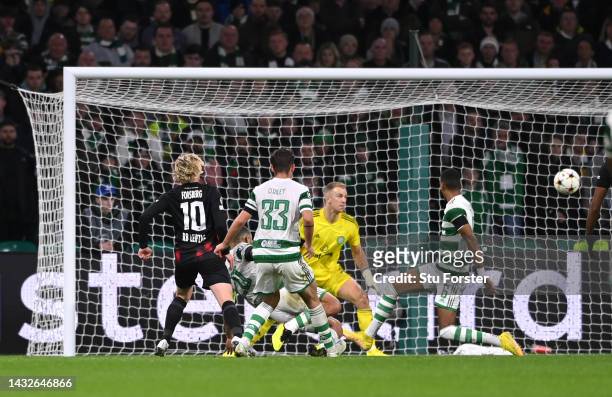 Emil Forsberg of FC Leipzig scores their team's second goal past Joe Hart of Celtic during the UEFA Champions League group F match between Celtic FC...