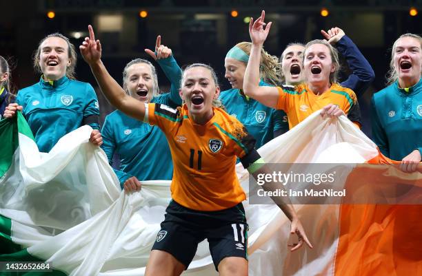 Katie McCabe of Republic of Ireland celebrates with teammates after their side qualifies for the 2023 FIFA Women's World Cup after victory during the...