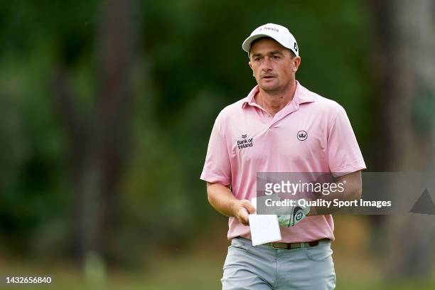 Paul Dunne of Ireland studies his shot during Day Four of the Acciona Open de Espana presented by Madrid at Club de Campo Villa de Madrid on October...