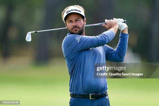 Victor Dubuisson of France watches his shot during Day Four of the Acciona Open de Espana presented by Madrid at Club de Campo Villa de Madrid on...