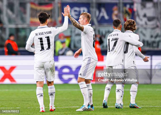 Marco Asensio, Toni Kroos, Lucas Vazquez and Luka Modric players of Real Madrid celebrate Antonio Rudiger goal during the UEFA Champions League group...