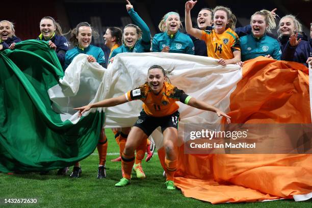 Katie McCabe of Republic of Ireland celebrates with teammates after their side qualifies for the 2023 FIFA Women's World Cup after victory during the...