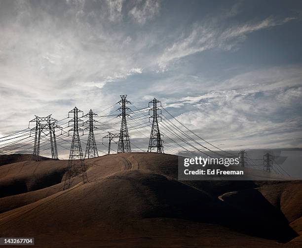power lines in california hills - electricity pylon imagens e fotografias de stock