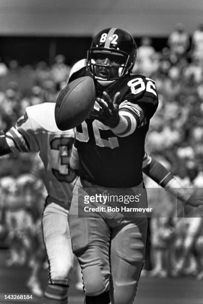 Wide receiver John Stallworth of the Pittsburgh Steelers watches a pass roll off his fingertips during the game against the Houston Oilers on...