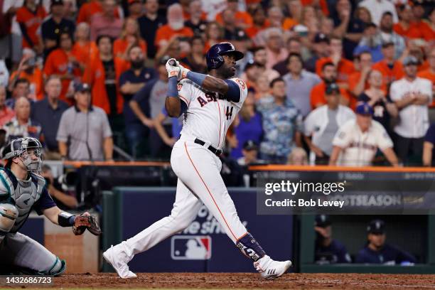 Yordan Alvarez of the Houston Astros hits a walk-off home run against the Seattle Mariners during the ninth inning in game one of the American League...