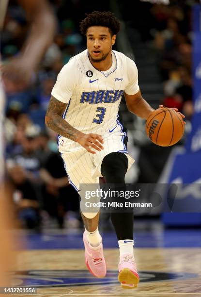 Chuma Okeke of the Orlando Magic brings the ball up the floor during a preseason game against the Memphis Grizzlies at Amway Center on October 11,...