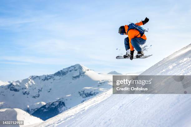 man skier in action in backcountry area with fresh powder snow at whistler-blackcomb ski resort - snowboard jump bildbanksfoton och bilder