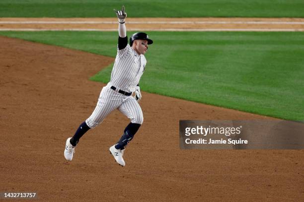 Harrison Bader of the New York Yankees celebrates after hitting a solo home run against Cal Quantrill of the Cleveland Guardians during the third...