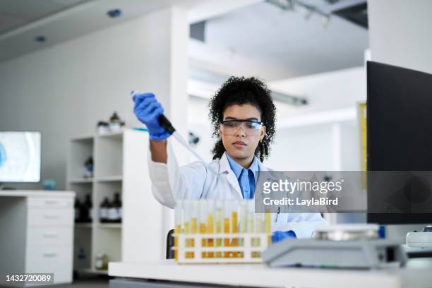 science, research and innovation with a woman engineer working in her lab with a dropper and medical sample. analytics, development and breakthrough with a female scientist at work in a laboratory - forensic science lab stock pictures, royalty-free photos & images