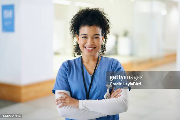 medical healthcare, portrait and expert doctor consulting and working as management of hospital. proud black woman and nurse with smile and arms crossed for surgery, consultation and trust at clinic - nurse arms crossed stock pictures, royalty-free photos & images