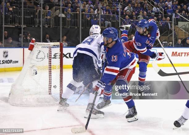 Mika Zibanejad of the New York Rangers scores a second period goal against Andrei Vasilevskiy of the Tampa Bay Lightning at Madison Square Garden...