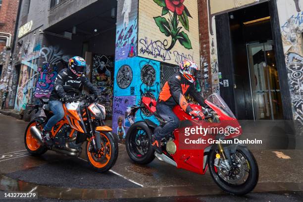 Jack Miller and Remy Gardner of Australia ride their motorcycles along Duckboard Place to ACDC Lane during a MotoGP preview media opportunity on...