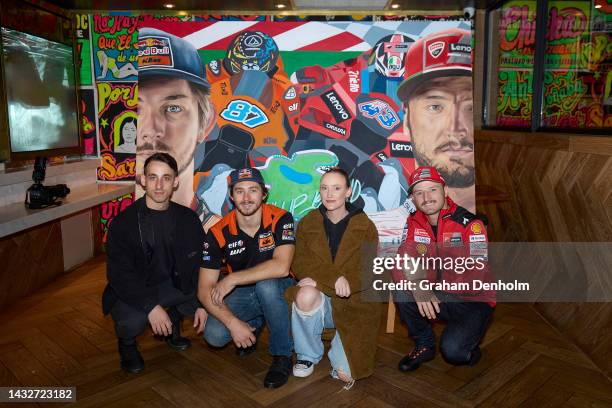 Jack Miller and Remy Gardner of Australia pose in front of an artwork by Justine Millsom and Marco Pennacchia during a media call at Duckboard Place...