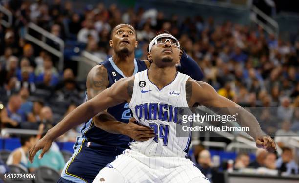 Wendell Carter Jr. #34 of the Orlando Magic boxes out Xavier Tillman of the Memphis Grizzlies during a preseason game at Amway Center on October 11,...