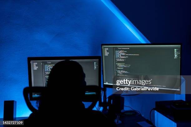 woman programming software codes overnight - hackathon stock pictures, royalty-free photos & images
