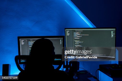 Woman programming software codes overnight Woman programming software codes overnight