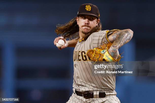 Mike Clevinger of the San Diego Padres pitches during the first inning in game one of the National League Division Series against the Los Angeles...