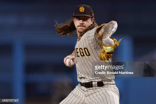 Mike Clevinger of the San Diego Padres pitches during the first inning in game one of the National League Division Series against the Los Angeles...