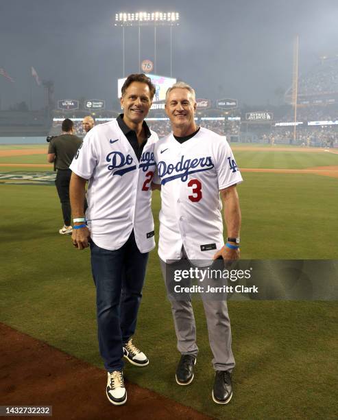 Former LA Dodgers Eric Karros and Steve Sax attend game one of the National League Division Series against the San Diego Padres at Dodger Stadium on...