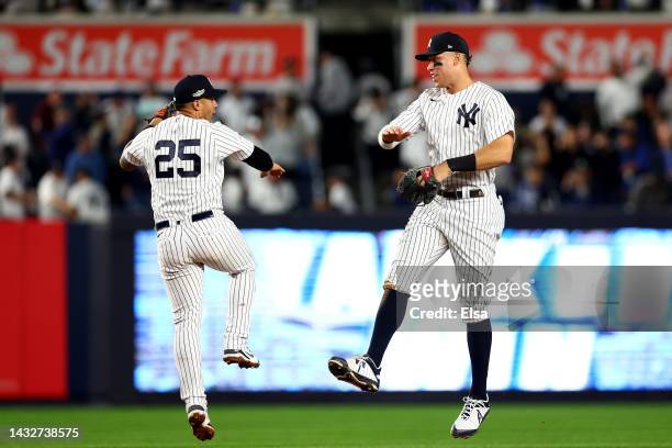 Aaron Judge and Isiah Gleyber Torres of the New York Yankees celebrate after defeating the Cleveland Guardians in game one of the American League...