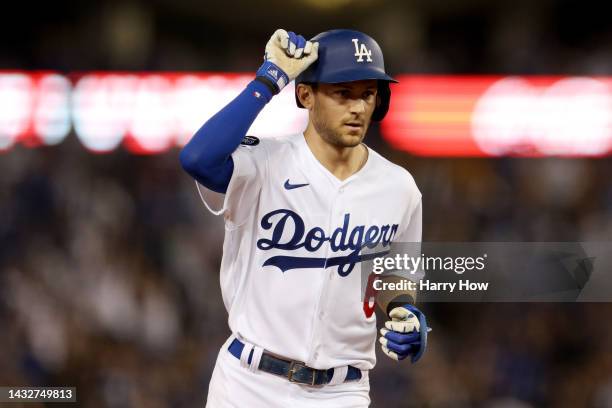 Trea Turner of the Los Angeles Dodgers rounds the bases after hitting a solo home run during the first inning in game one of the National League...