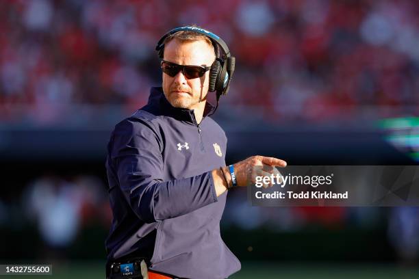 Head coach Bryan Harsin of the Auburn Tigers looks on in the second half against the Georgia Bulldogs at Sanford Stadium on October 8, 2022 in...