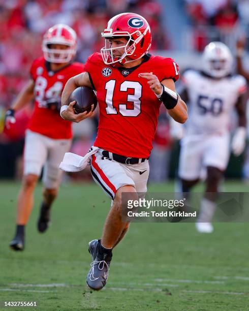 Stetson Bennett of the Georgia Bulldogs breaks loose for a touchdown in the second half against the Auburn Tigers at Sanford Stadium on October 8,...