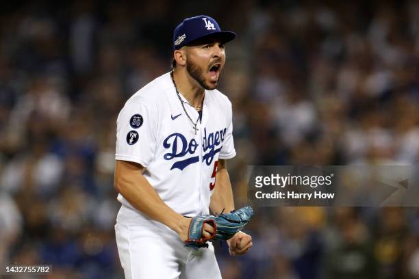 Alex Vesia of the Los Angeles Dodgers celebrates after a strike out to end the top of the seventh inning in game one of the National League Division...