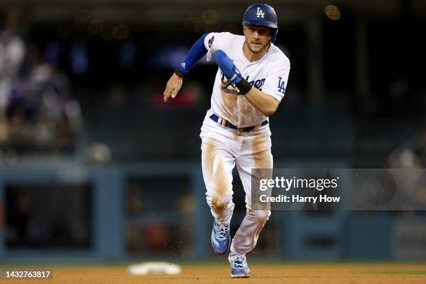 Trea Turner of the Los Angeles Dodgers runs home to score in the third inning during game one of the National League Division Series against the San...